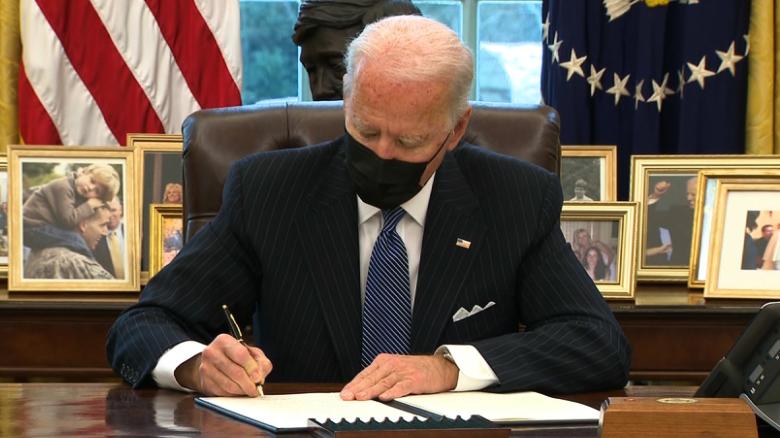 See Biden sign executive order lifting transgender military ban
