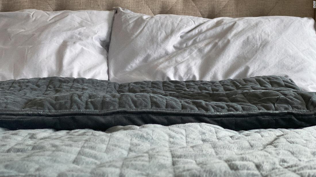 Weighted blanket benefits for anxiety and sleep - CNN