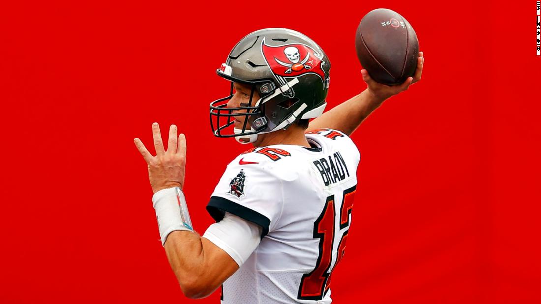Brady throws a pass during a game against Carolina in September 2020. Brady finished the regular season with 40 touchdown passes and 12 interceptions as the Buccaneers went 11-5.