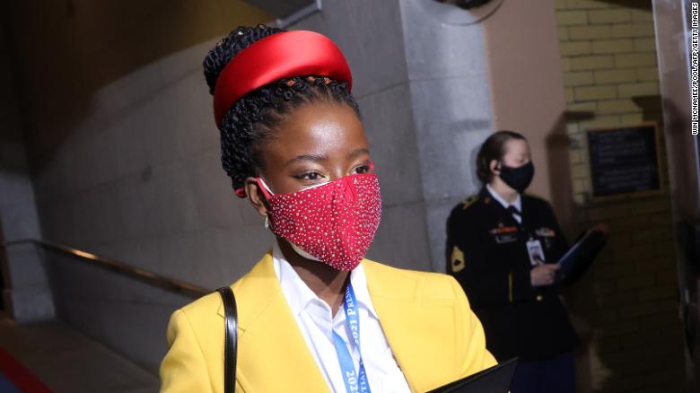National youth poet laureate Amanda Gorman arrived at the inauguration wearing a double mask.