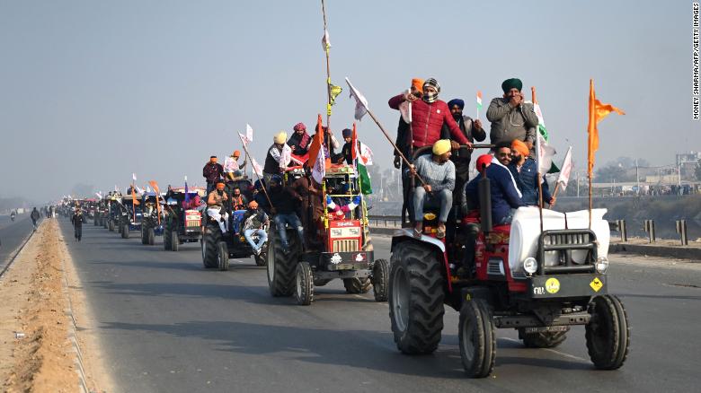 Farmers take part in a tractor rally as they continue to demonstrate against the central government&#39;s recent agricultural reforms in New Delhi on January 26, 2021. 