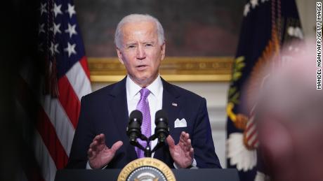 US President Joe Biden speaks on Covid-19 response in the State Dining Room of the White House in Washington, DC on January 26, 2021.