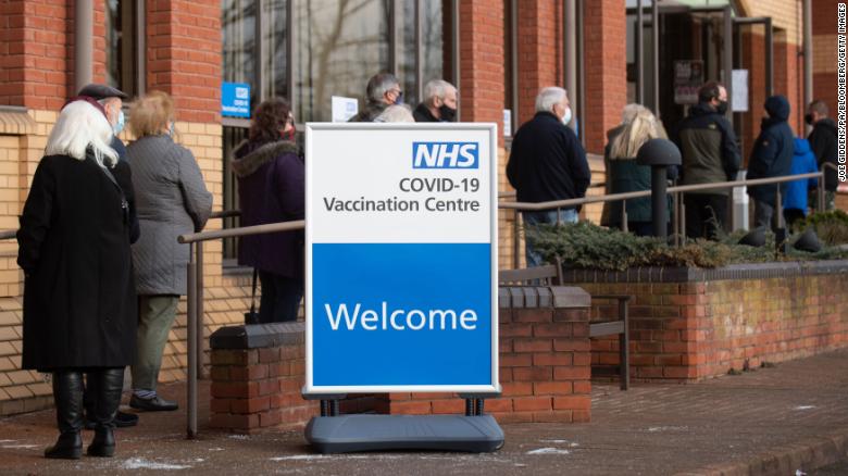 People line up outside a Covid-19 vaccination center in Stevenage, in central England, on January 11.