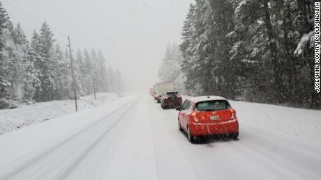 Health workers trapped in snow give coronavirus vaccine to stranded drivers