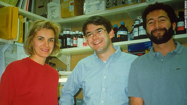 Dr. Dan Kastner (center) is shown in his NIH lab in 1990 with his colleagues Dr. Ivona Aksentijevich and Dr. Luis Gruberg.