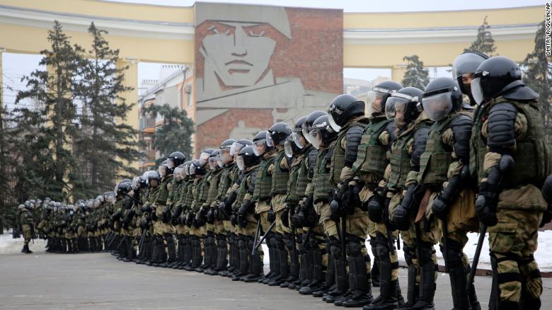Police block the way during a protest against the detention of Navalny in Volgograd, Russia, on Sunday.