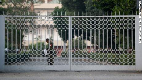 An armed military soldier stands guard in front of the regional government office in Yangon, Myanmar, on February 1. 