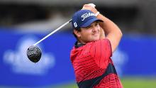 Reed watches his tee shot on the 7th hole during the final round of the Farmers Insurance Open.