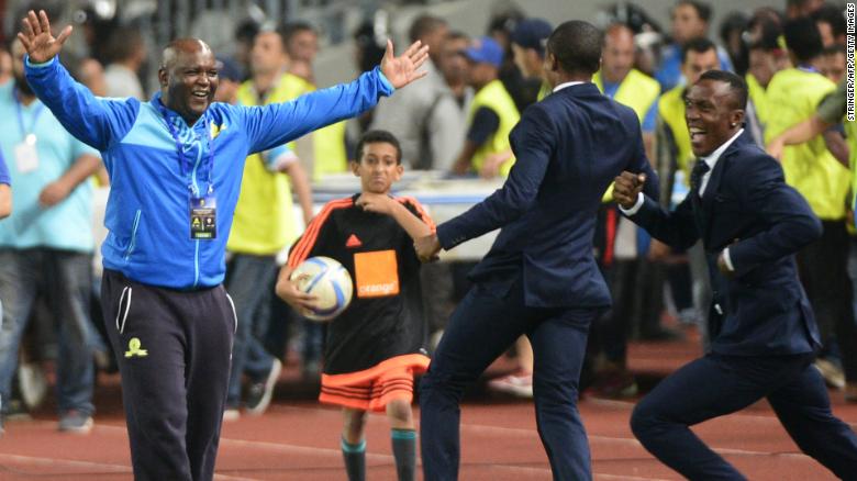 Sundowns' coach Pitso Mosimane reacts after winning the CAF Champions League following the final between Zamalek and Mamelodi Sundowns on October 23, 2016 at the Borg el-Arab Stadium near Alexandria.