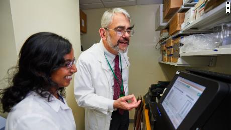 Dr. Daniel Kastner, right, in his lab in 2018 with Dr. Kalpana Manthiram, a clinical fellow at the National Human Genome Research Institute and a colleague of Kastner.