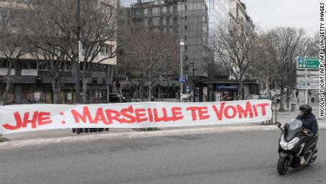 A protest banner against club president Jacques-Henri Eyraud reads: &quot;JHE: Marseille vomits you.&quot;