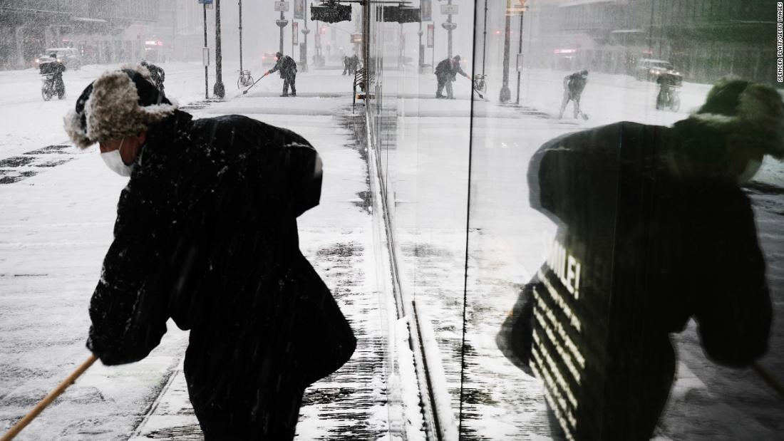 Workers clean the streets of New York on Monday.