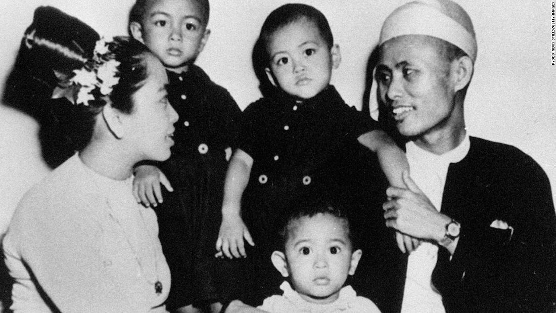 Suu Kyi, front center, is seen with her parents and her two elder brothers in 1947. Her father, Aung San, was the commander of the Burma Independence Army and helped negotiate the country&#39;s independence from Britain. He was assassinated on July 19, 1947. Suu Kyi&#39;s mother, Ma Khin Kyi, was a diplomat who was once an ambassador to India.