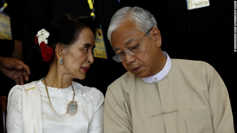 Suu Kyi and President Kyaw talk at a conference in Naypyidaw in 2016.