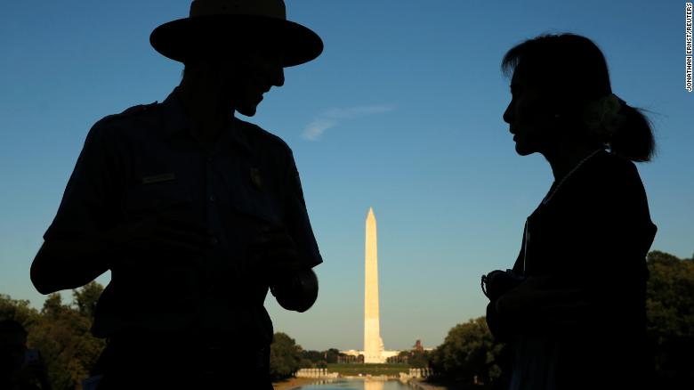 Suu Kyi is guided by National Park Service Ranger Heath Mitchell on her visit to Washington, DC, in 2016.