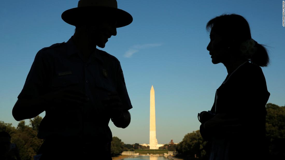 Suu Kyi is guided by National Park Service Ranger Heath Mitchell on her visit to Washington, DC, in 2016.