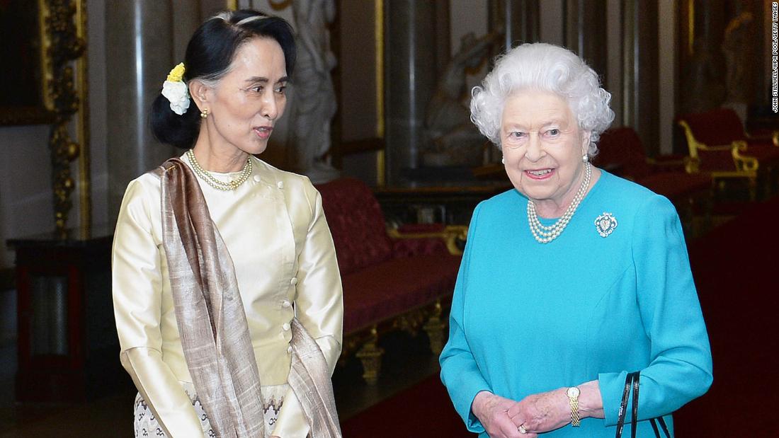 Britain&#39;s Queen Elizabeth II greets Suu Kyi ahead of a private lunch at Buckingham Palace in 2017.