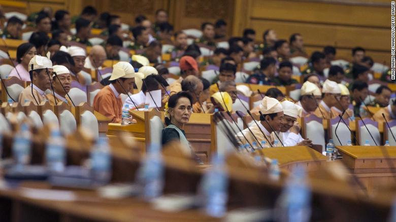 Suu Kyi and members of parliament take their positions during the presidential vote in Naypyidaw, Myanmar, in 2016. Htin Kyaw, Suu Kyi's longtime aide, was voted as president.