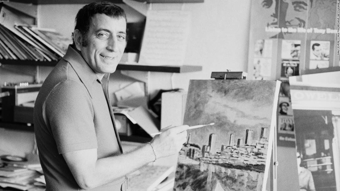Bennett paints a city landscape in 1971.
