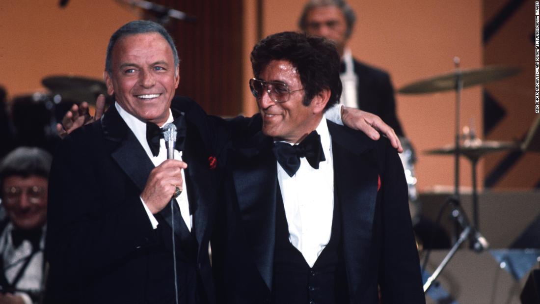 Frank Sinatra puts his arm around Bennett in the TV special &quot;Frank Sinatra and Friends&quot; in 1977.