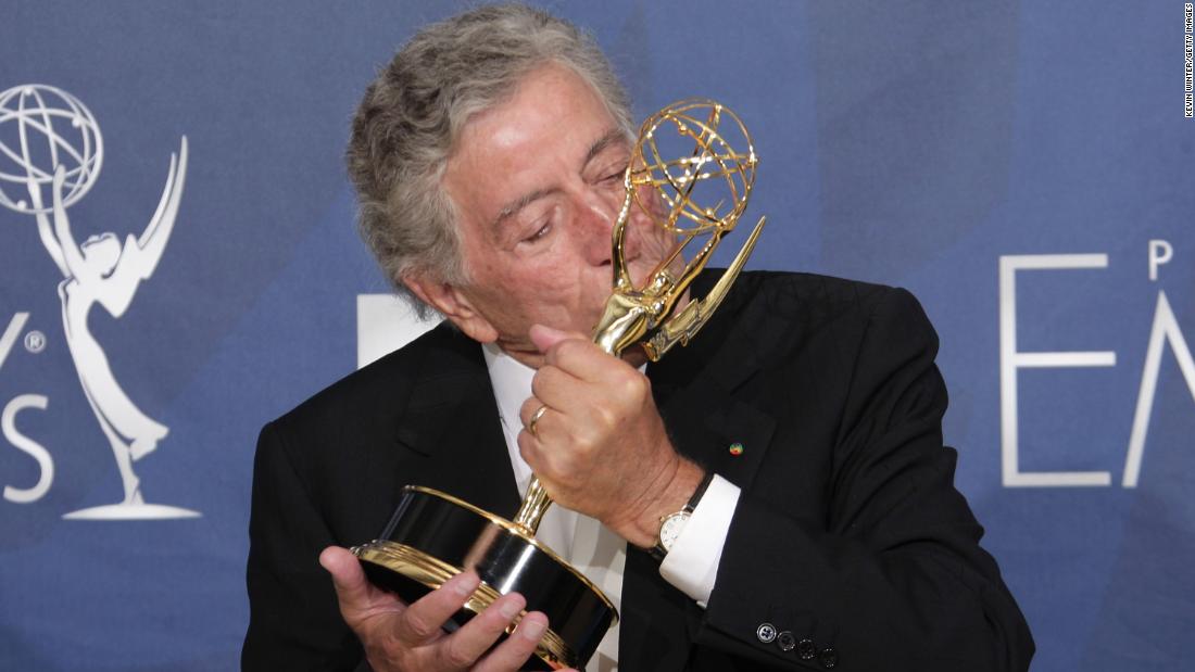 Bennett kisses an Emmy Award he won in 2007 for the TV special &quot;Tony Bennett: An American Classic.&quot;