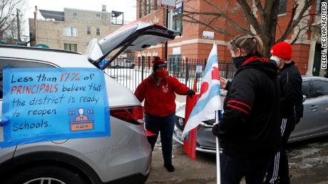 Supporters of the Chicago Teachers Union prepare for a car caravan on January 30.