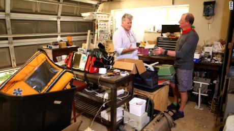 SAVE-P founder Justin Corbett (left) and ventilator technician Robin Whittle (right) in Whittle&#39;s garage in Durban, South Africa.