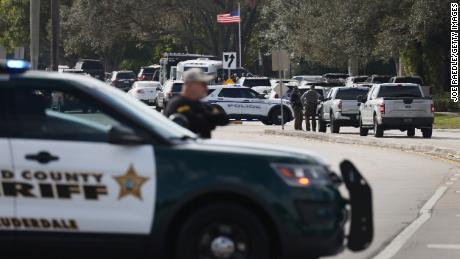 Law enforcement cordoned off an area near the agent's death in Sunrise, Florida.