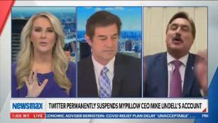 Watch Newsmax anchor walk off set during MyPillow CEO interview - CNN Video