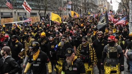 Members of the Proud Boys march during a protest on December 12, 2020, in Washington, DC. 