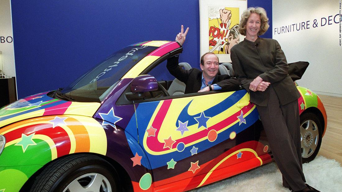 Bezos and Sotheby&#39;s president and CEO Diana Brooks pose in a customized Volkswagen Beetle from the film &quot;Austin Powers: The Spy Who Shagged Me&quot; in 1999. Sotheby&#39;s and Amazon had teamed up to launch sothebys.amazon.com, an online auction site that would offer a broad range of objects, including this car.