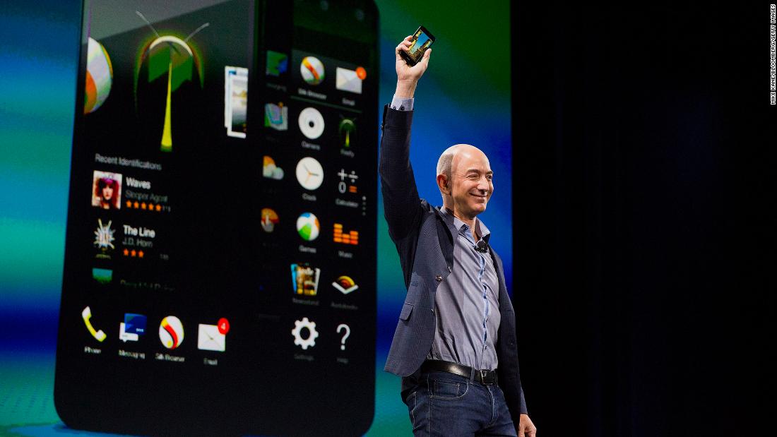 Bezos unveils the Fire Phone during an event in Seattle in 2014.