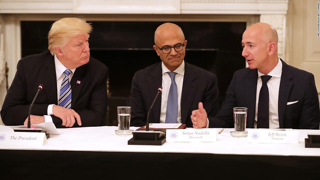 US President Donald Trump and Microsoft CEO Satya Nadella listen to Bezos at a White House meeting of the American Technology Council in 2017. According to the White House, the council&#39;s goal is &quot;to explore how to transform and modernize government information technology.&quot;  
