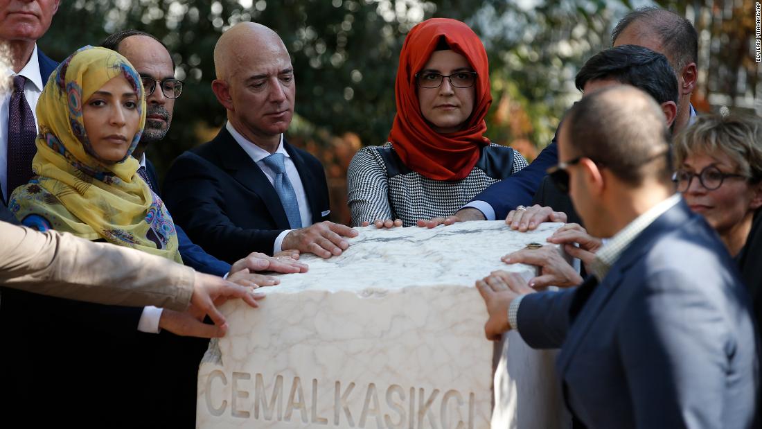 Bezos stands next to Hatice Cengiz, the fiancee of the late journalist Jamal Khashoggi, as a plaque is unveiled near the Saudi consulate in Istanbul in 2019. It was a year after Khashoggi, a Washington Post columnist, was killed.
