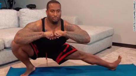 Mike Daniels performs deep lateral lunges, which improve hip mobility.  He practices yoga twice a week.