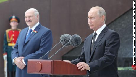 Russian President Vladimir Putin, right, and Belarus&#39; leader Alexander Lukashenko at a ceremony unveiling the Soviet Soldier Memorial near Rzhev, in Russia on June 30, 2020.