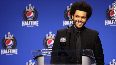 What if The Weeknd's Super Bowl halftime show set just looked like a postgame press conference dais?