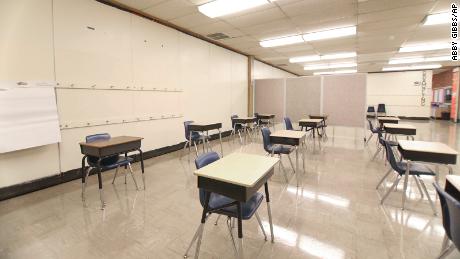 In Foust Elementary, classrooms are set up to accommodate physical distancing standards on Friday, Oct. 23, 2020 in Greensboro, N.C. Between classrooms, are movable walls and dividers since the school was originally integrated with students from multiple grades in one class. [Abby Gibbs/The News &amp; Record].