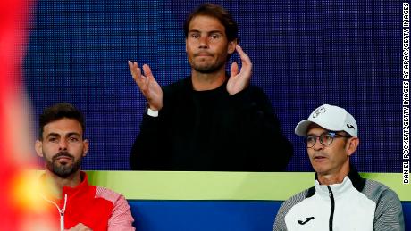 Nadal watches on during Spain&#39;s  ATP Cup match.