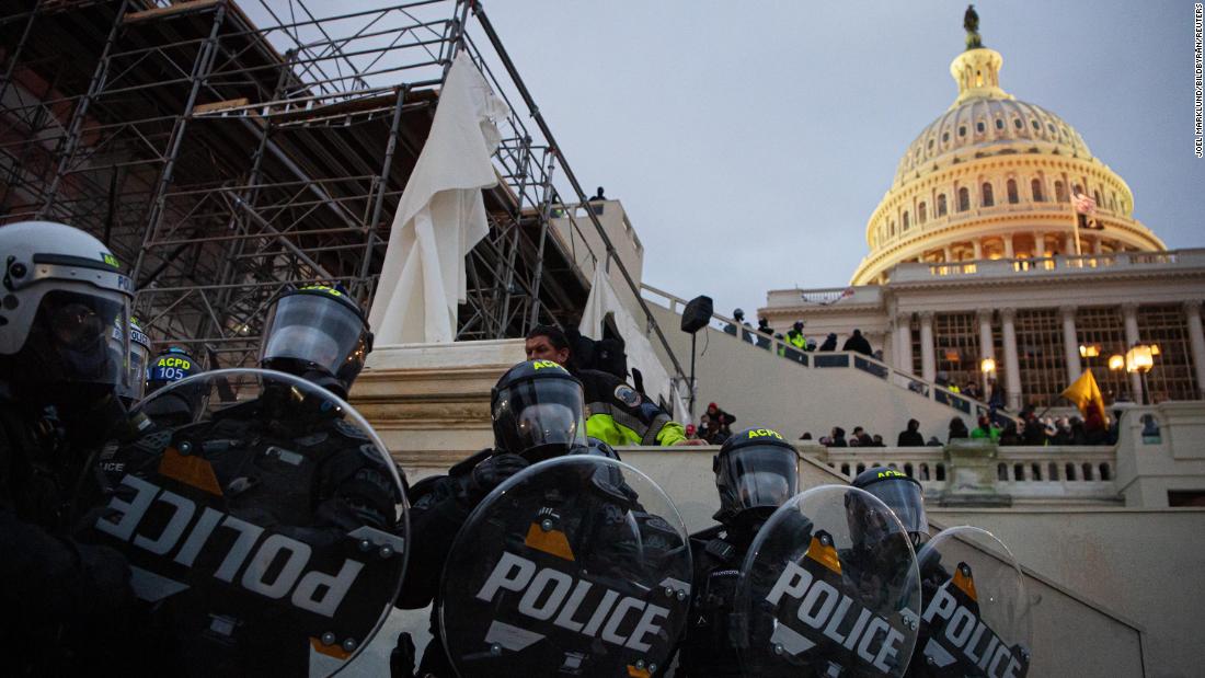New radio and video footage from Capitol riot shows a coordinated attack and officers' restraint