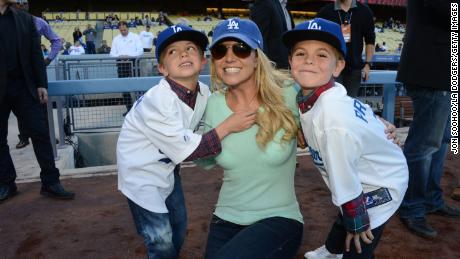 Britney Spears poses with sons Jayden James Federline (L) and Sean Preston Federline (R) at Dodger Stadium on April 17, 2013.