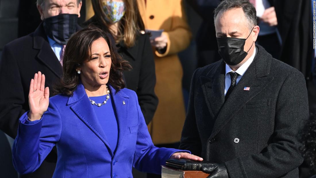 Kamala Harris, flanked by husband Doug Emhoff, is sworn in as the 49th US Vice President on January 20 at the US Capitol in Washington. 