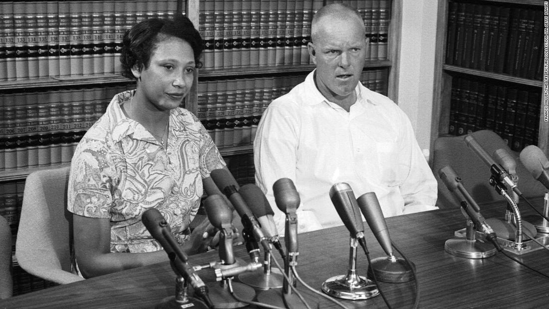 Mildred and Richard Loving answer questions at a press conference the day after the Supreme Court ruled in their favor in the Loving v. Virginia case in June 1967. The ruling held that laws banning interracial marriage were unconstitutional.