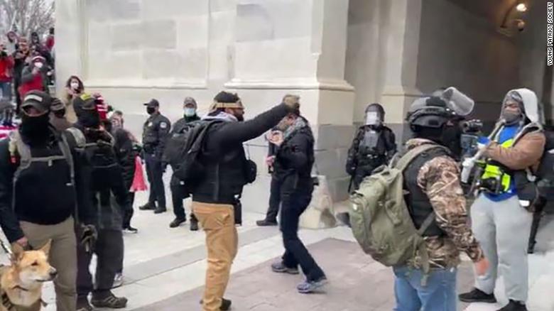 Roberto Minuta protests outside the US Capitol on January 6th.