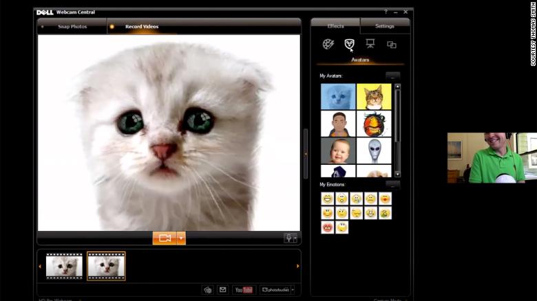 Thomas Smith demonstrates the kitten filter during an interview with CNN Business.