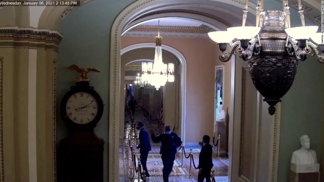 New security video shows Officer Eugene Goodman potentially saving Mitt Romney from mob during Capitol riot