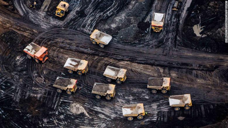 Heavy haulers are seen at the Athabasca oil sands in Alberta, Canada.