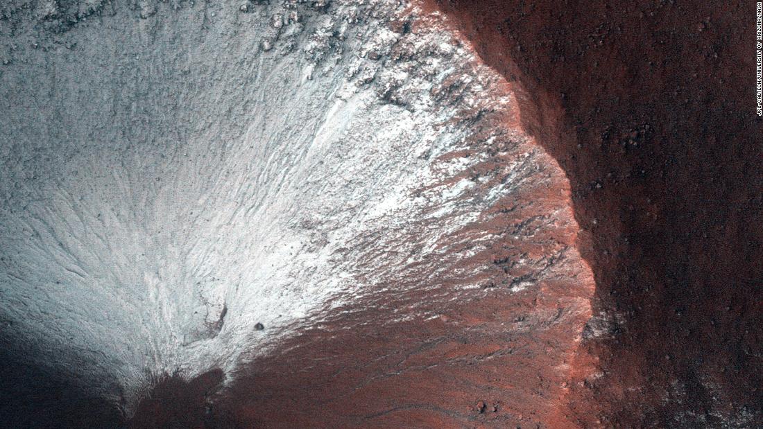 HiRISE took this image of a kilometer-size crater in the southern hemisphere of Mars in June 2014. The crater shows frost on all its south-facing slopes in late winter as Mars is heading into spring.