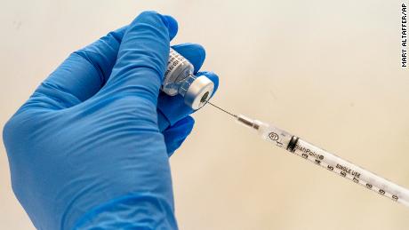 Pharmacies start administering their first 1 million Covid-19 vaccine doses from federal government