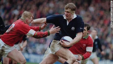 Doddie Weir (centre) of Scotland, hands off Neil Jenkins of Wales during a Five Nations Championship match at Murrayfield Stadium, Edinburgh, Scotland, 4th March 1995. Scotland won the match 26-13. (Photo by David Rogers/Getty Images)